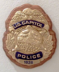 capitol police officer badge arrested dispute maryland pointing gun hotel after ruben castaneda