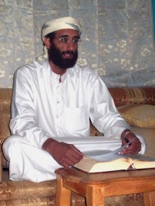 Anwar_al-Awlaki_sitting_on_couch,_lightened