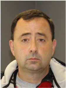 Larry Nassar is charged with child pornography.
